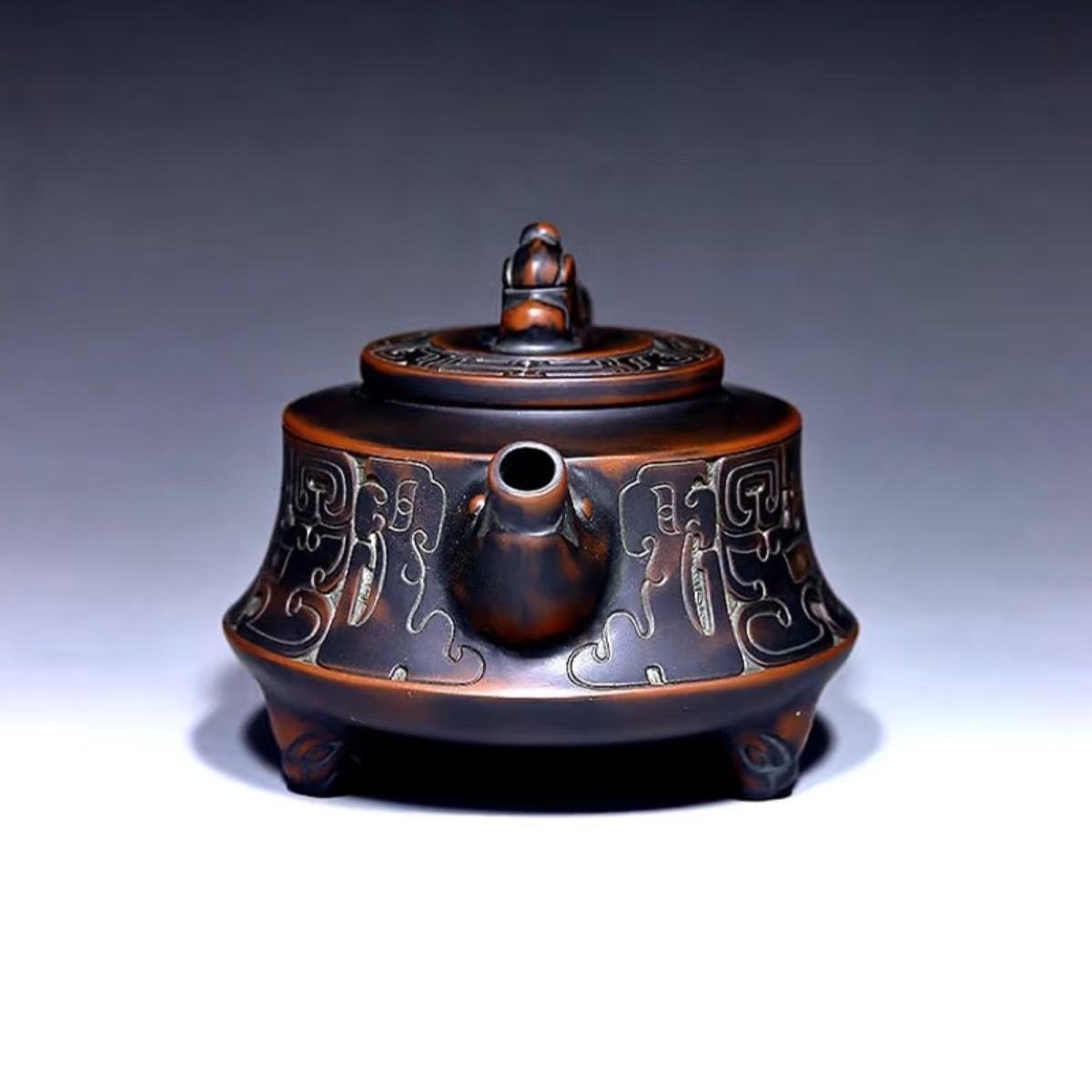 Hand-carved Nixing clay teapot - product detail view 2