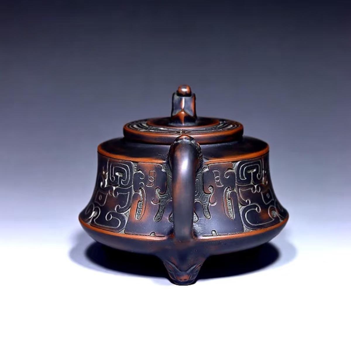 Hand-carved Nixing clay teapot - product detail view 3