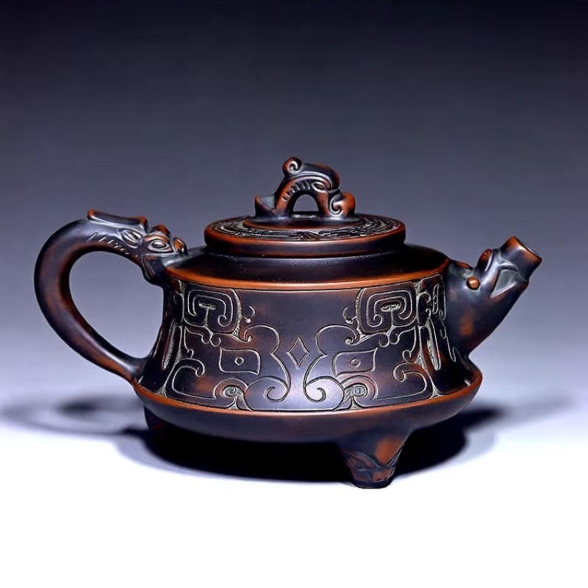Hand-carved Nixing clay teapot - product detail view 4