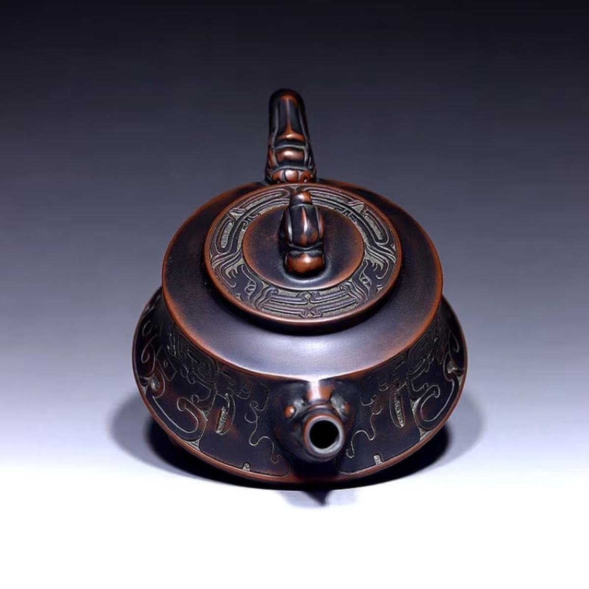 Hand-carved Nixing clay teapot - product detail view 5
