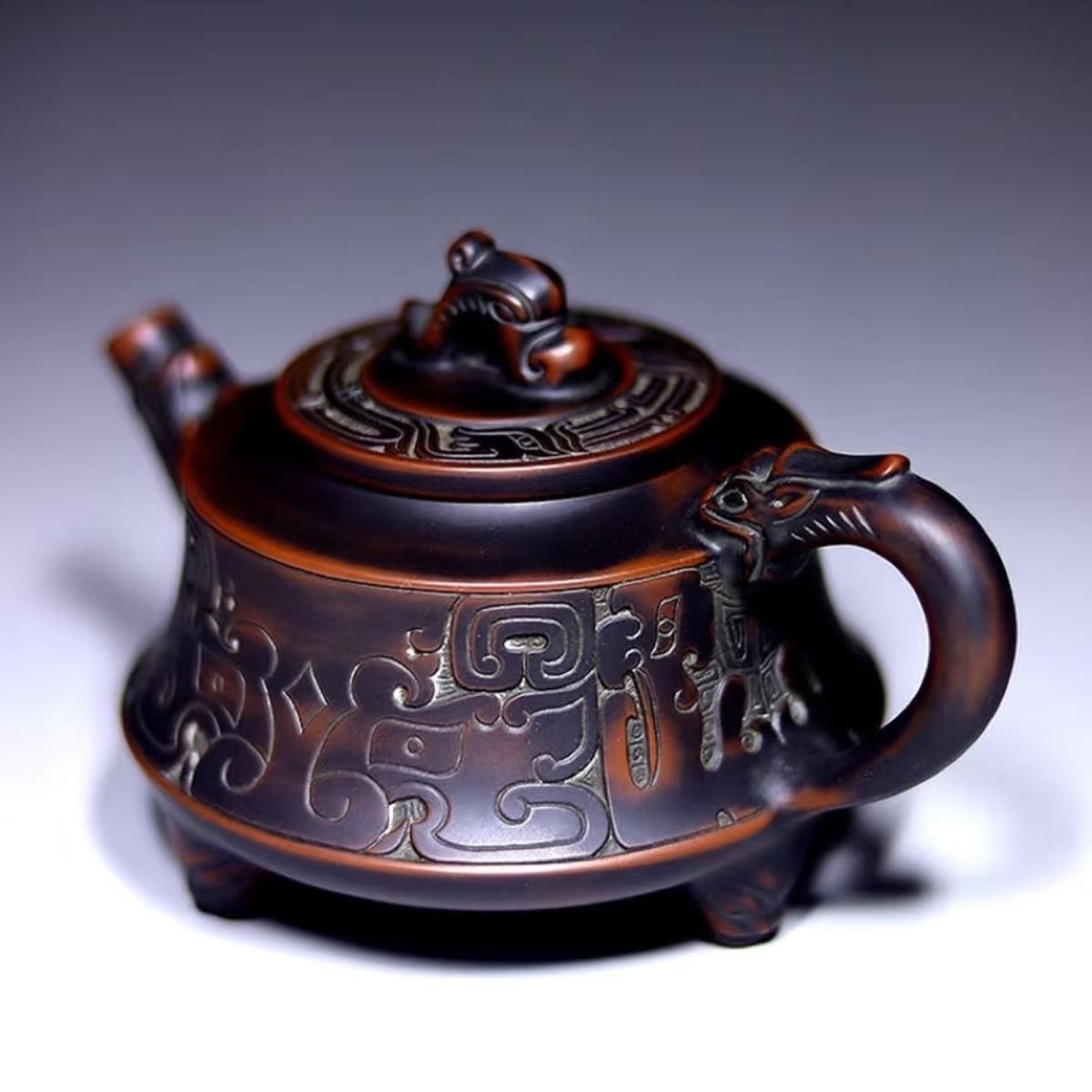 Hand-carved Nixing clay teapot - product detail view 7