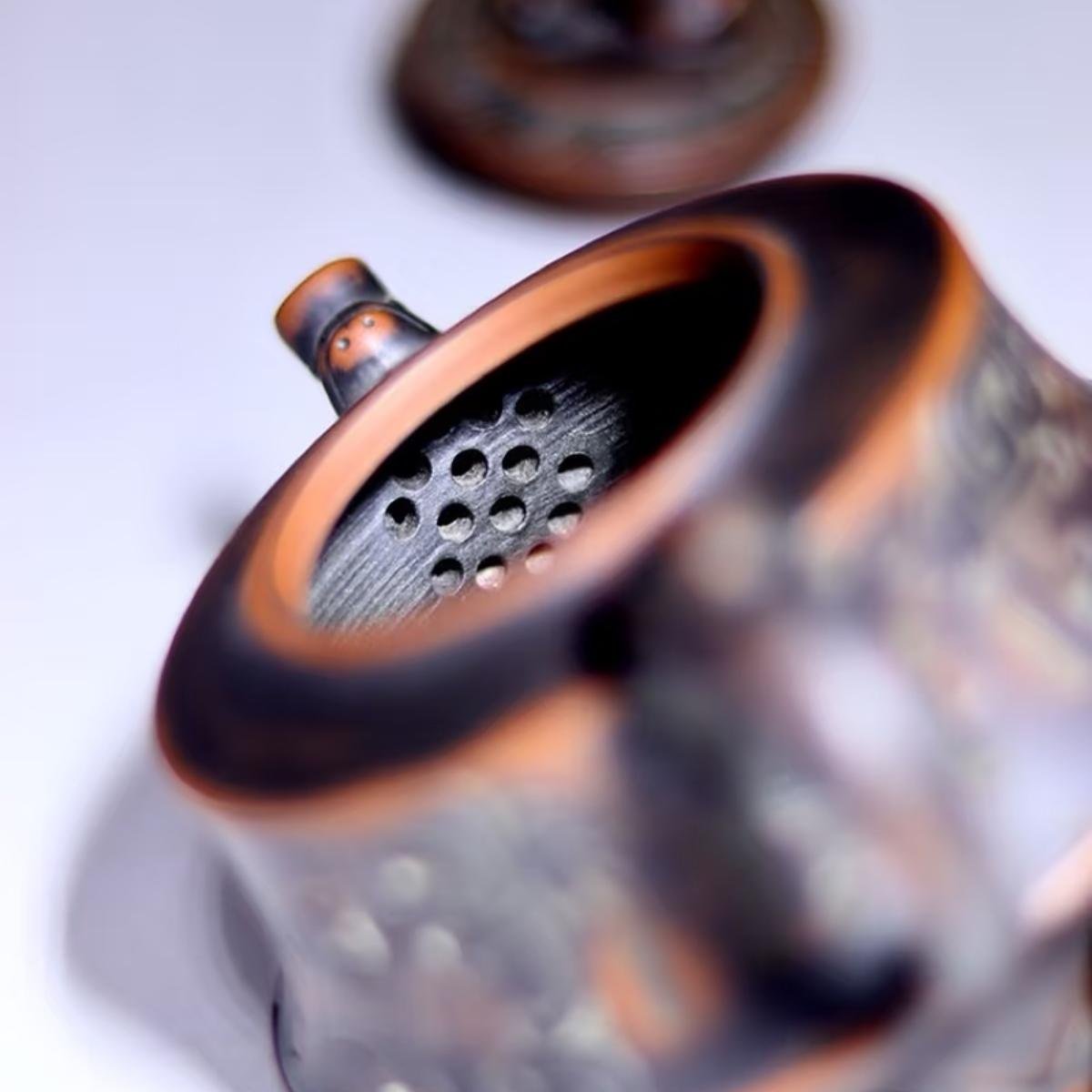 Hand-carved Nixing clay teapot - product detail view 8