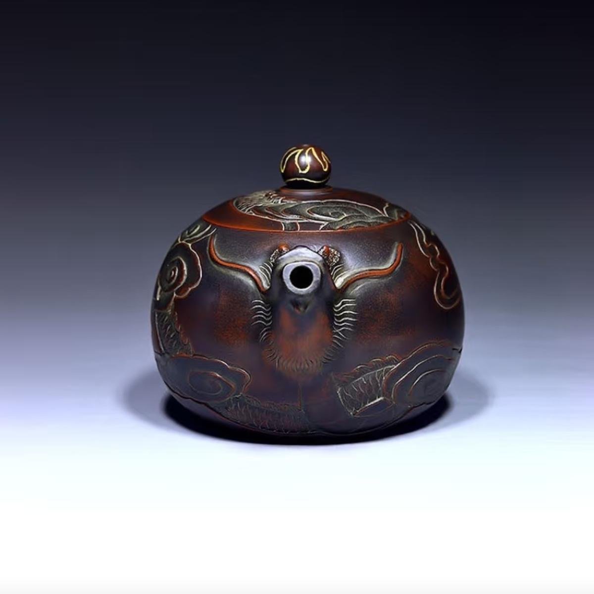 Hand-carved Nixing clay teapot - product detail view 2