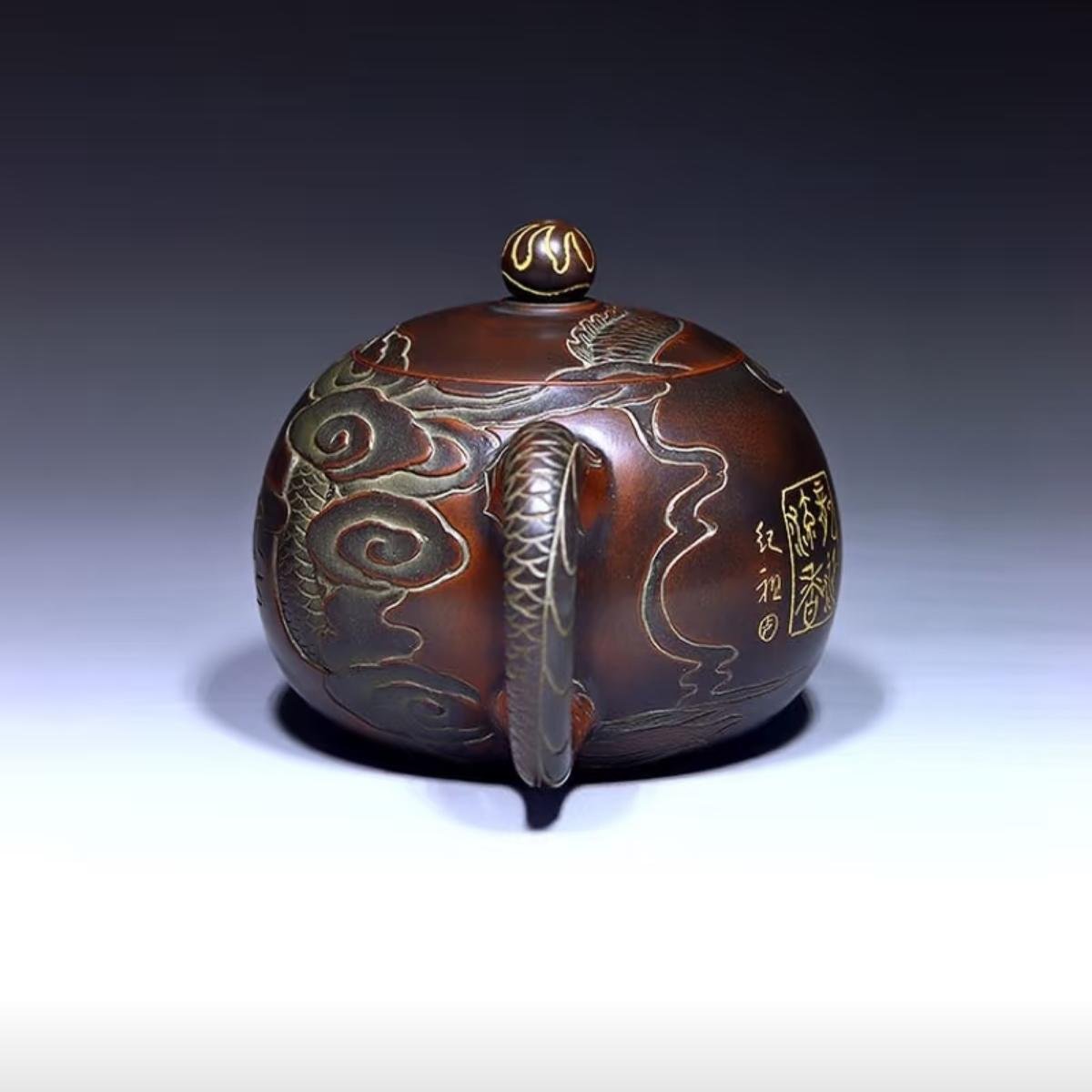 Hand-carved Nixing clay teapot - product detail view 3