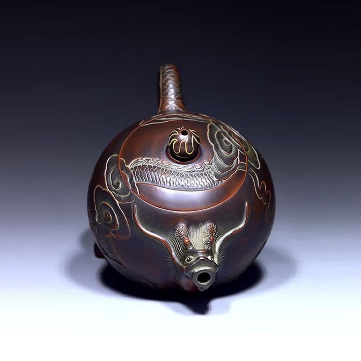 Hand-carved Nixing clay teapot - product detail view 5