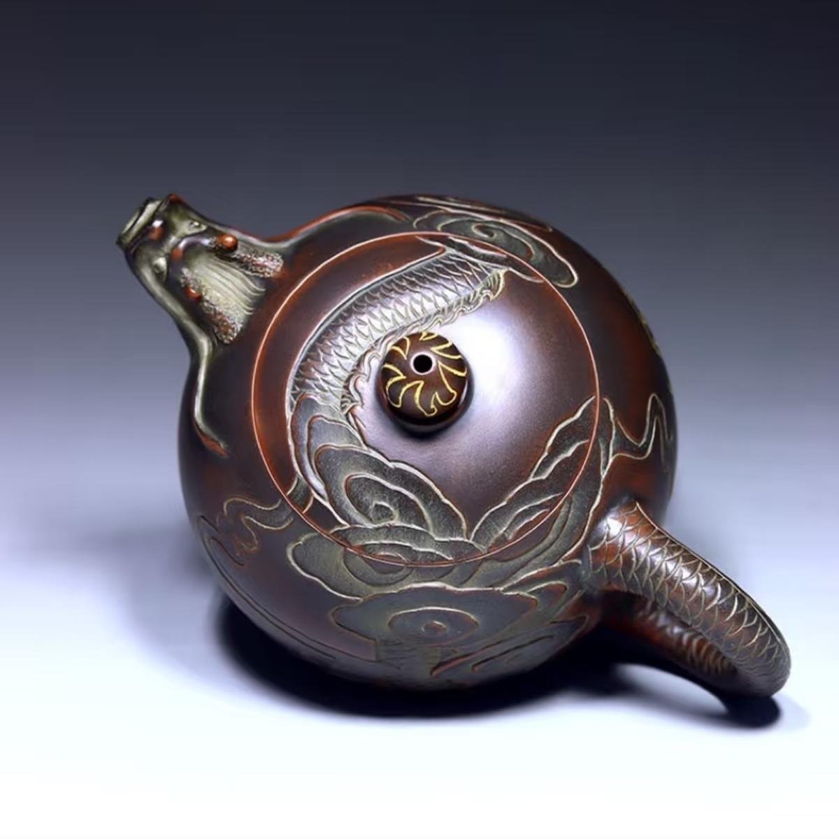 Hand-carved Nixing clay teapot - product detail view 7