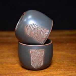 Handmade Nixing clay tea cup, Zhuang Brocade style - artisan pottery from Qinzhou, China