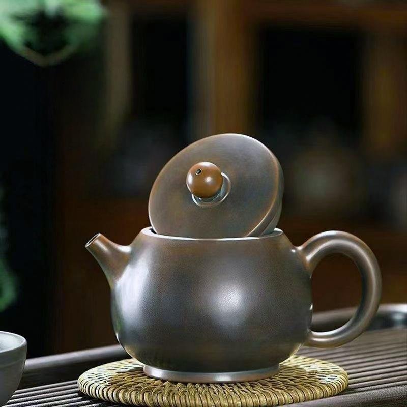 Hand-carved Nixing clay teapot, Plain Barrel of Gold style - product detail view 2