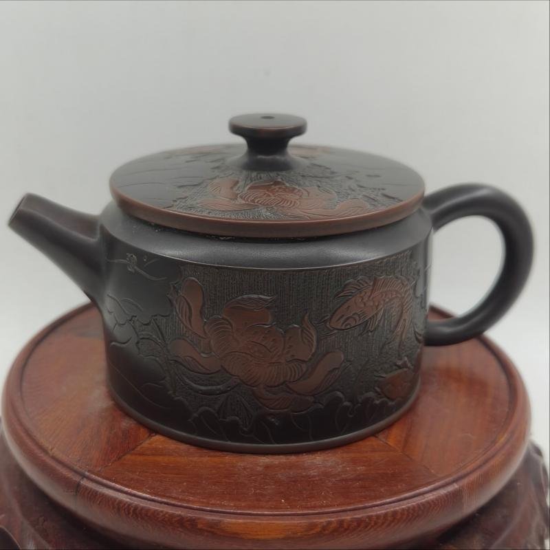Hand-carved Nixing clay teapot, Lotus & Fish style - product detail view 2