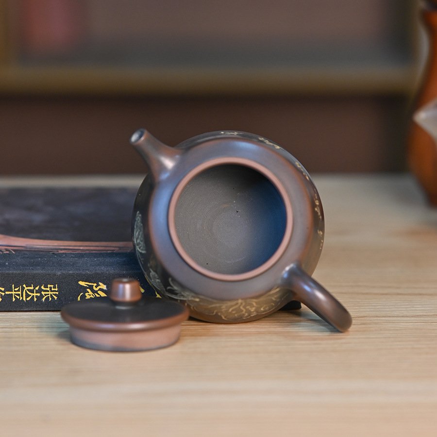 Hand-carved Nixing clay teapot, Relief-Carved Overlord style - product detail view 2