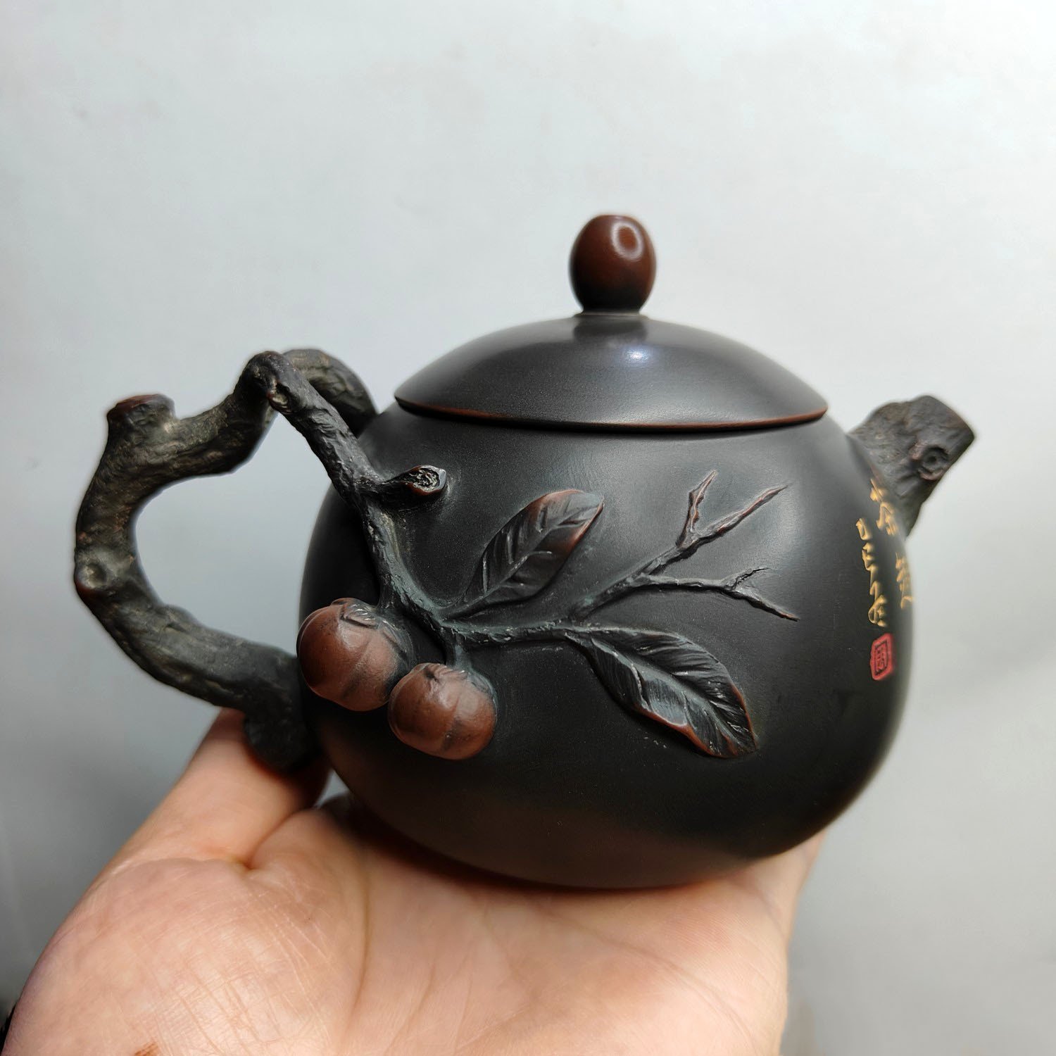 Hand-carved Nixing clay teapot, Persimmon Good Luck style - product detail view 2