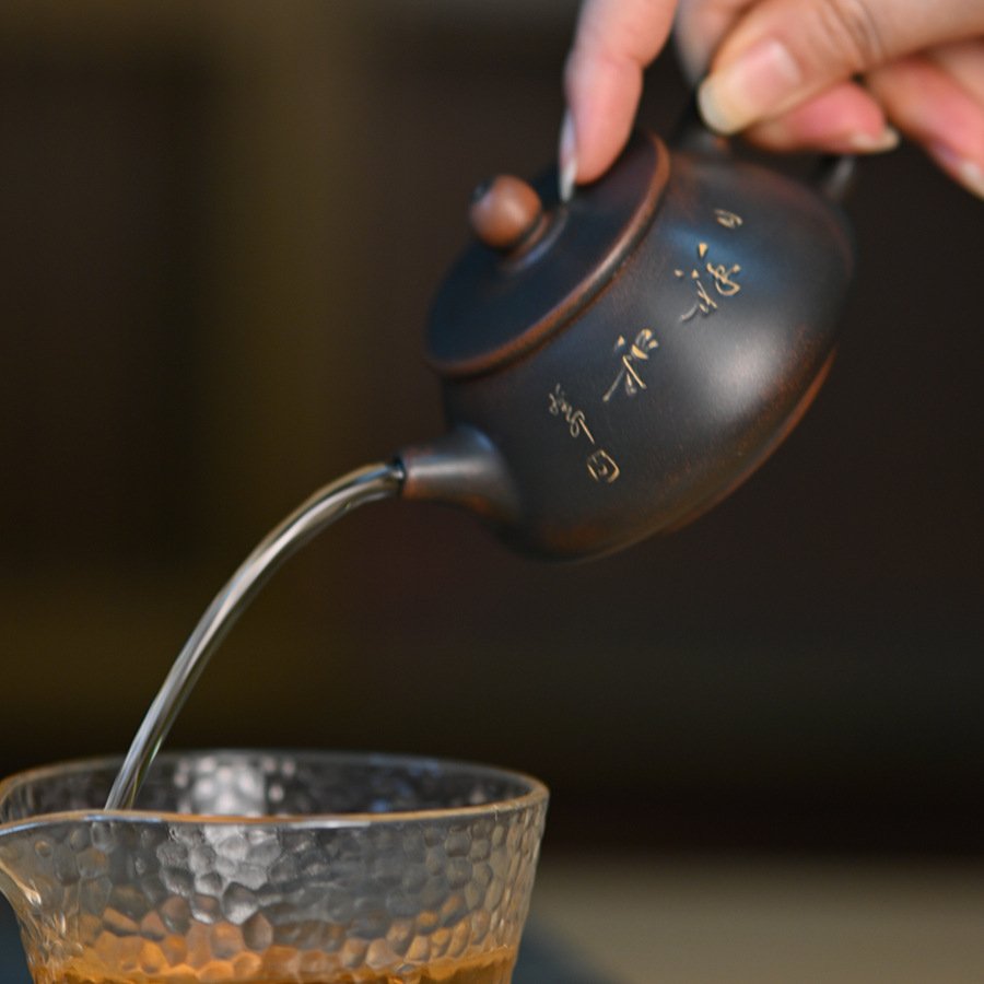 Hand-carved Nixing clay teapot - product detail view 3