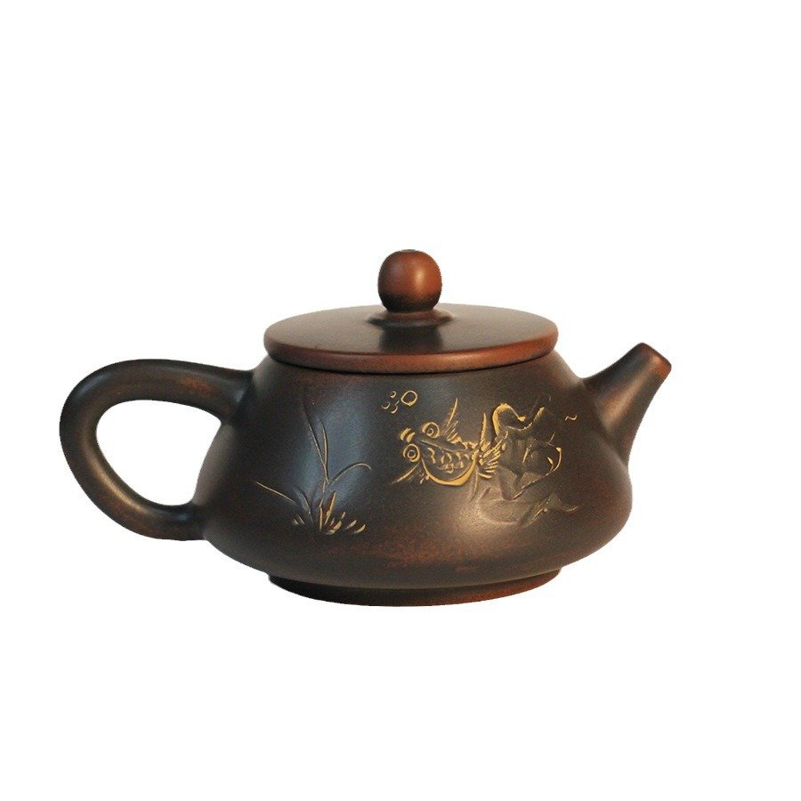 Hand-carved Nixing clay teapot - product detail view 4